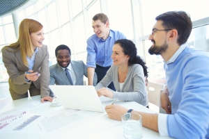 customer service strategies, 5 people working on a computer