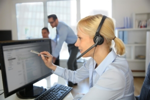 Self Service Technologies, woman on a computer